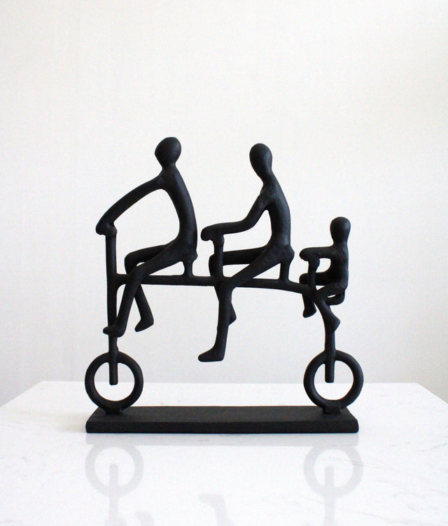Escultura Ciclistas